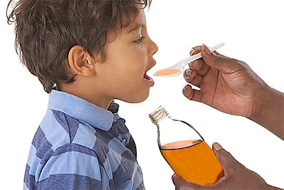 Kid taking medication